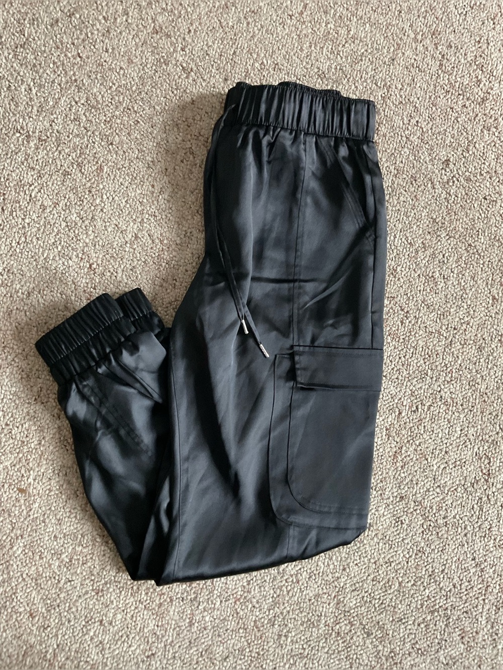 BLACK satin like pants with elastic bottoms and drawstring waist - like new